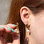 Arete martillado de sol luna perla 28mm