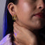 Arete silueta de flor irregular cristal 24mm