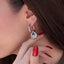 Arracada tubular con dije irregular colgante 34mm