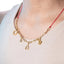 Collar cadena mixta con hilo y dijes de la suerte 45-50cm