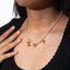 Collar de hilo con dije de cerezas llave y mariposa 40-45cm