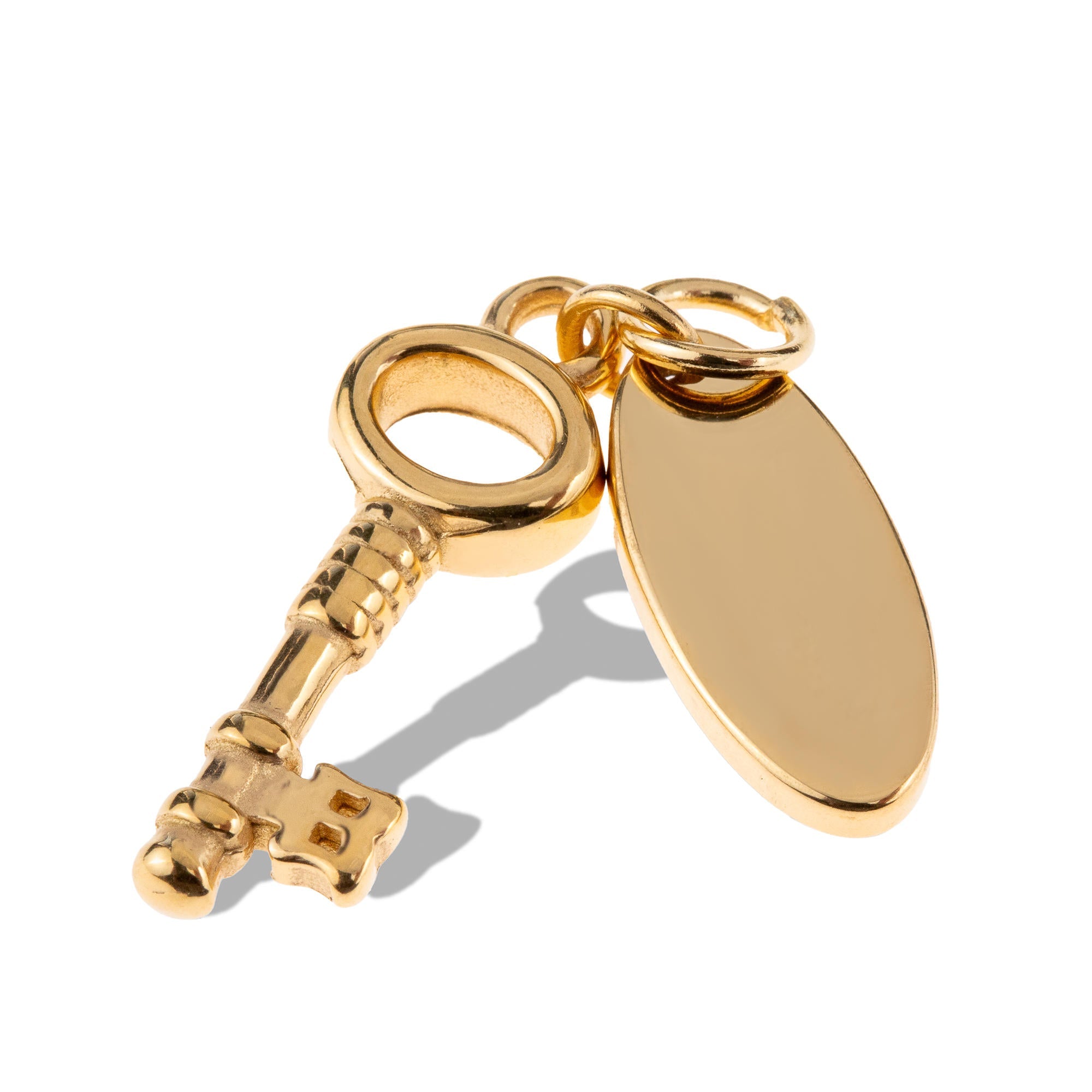 Dije de llave con placa ovalada colgante 20mm