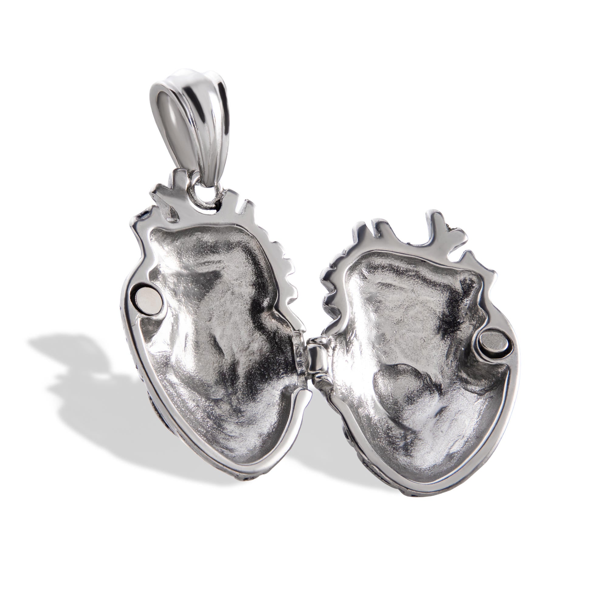 Dije Relicario de corazon anatomico 55mm