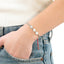 Pulsera de hilo medalla san benito y balin liso 8mm