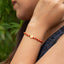 Pulsera ajustable hilo con balin liso medalla san benito 8mm