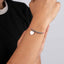 Pulsera hilo ajustable rosa bola lisa y corazon 4mm