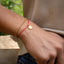 Pulsera doble hilo y balines medalla  san benito 17-21cm