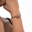 Brazalete liso con cadena y broche t 19cm