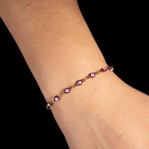 Pulsera de ojitos 4mm ciruela 15-20cm