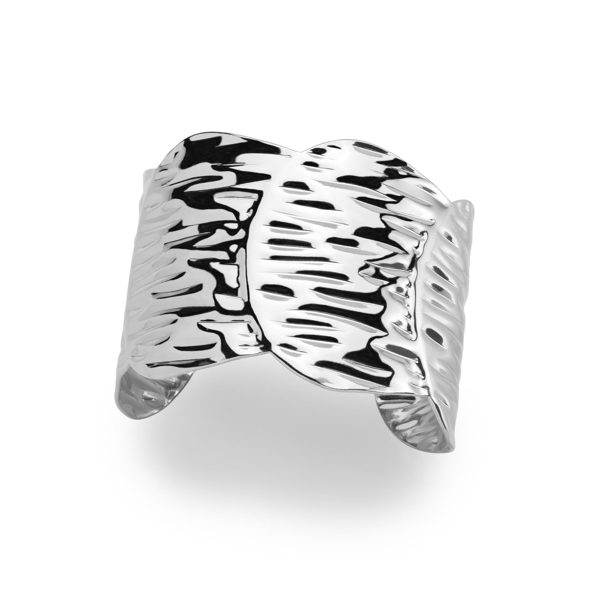 Brazalete ajustable asimetrico texturizado 50mm