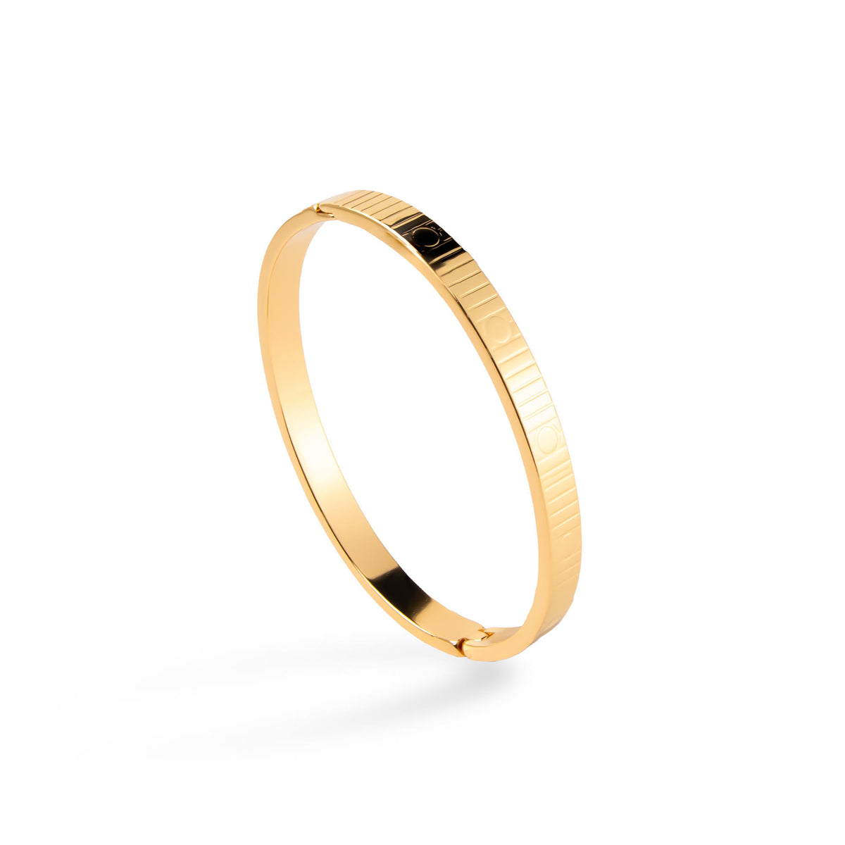 Brazalete con lineas y circulos grabados broche a presion 6cm