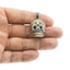 Dije calavera cristal esmeralda 26mm