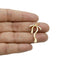 Dije de moño liston circonias liso 26mm