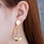 Arete largo ovalo torcido martillado 51mm