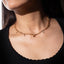Collar de mariposa moño y cerezas con circonias 40-45cm