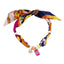 Bandana con dije de flor y placa con ojo turco esmaltado 90cm