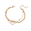 Pulsera doble de balines y cadena torsal con corazon 16-20cm