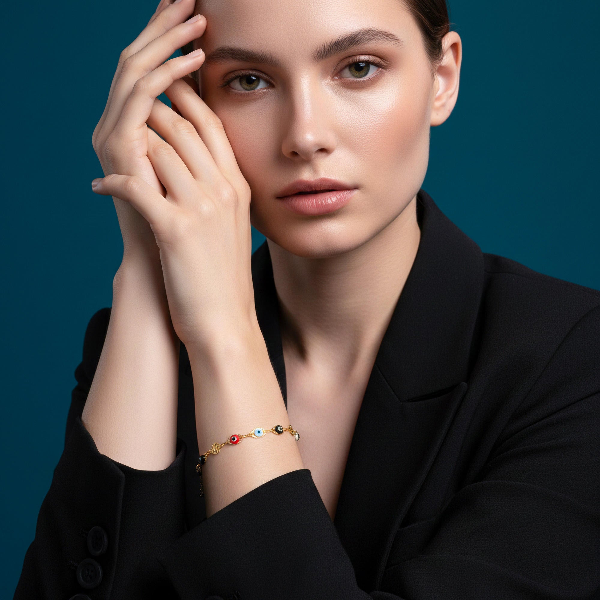 Pulsera ojitos y esferas 16cm