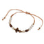 Pulsera de hilo ajustable con cruz de madera y cuentas pasta blanca 6mm